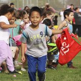 This happy Lemoore youngster appears to be having a great time at the Lemoore Lions Easter Egg Hunt, held Saturday in conjunction with the Lemoore Recreation Dept. and South Valley Church.